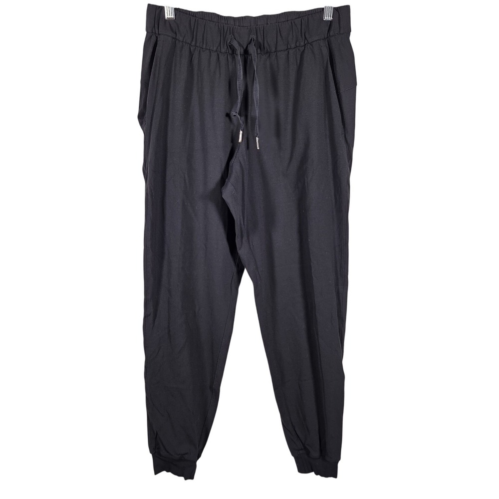 Lululemon On The Fly Jogger Wms 8 Black Drawstring High Rise Luxtreme Athleisure